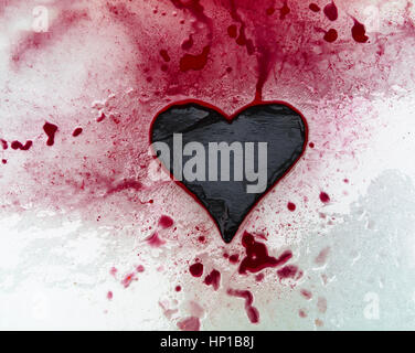 Coeur de l'ardoise et l'encre rouge sur la glace Banque D'Images