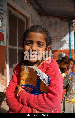 Indian girl with school book Banque D'Images