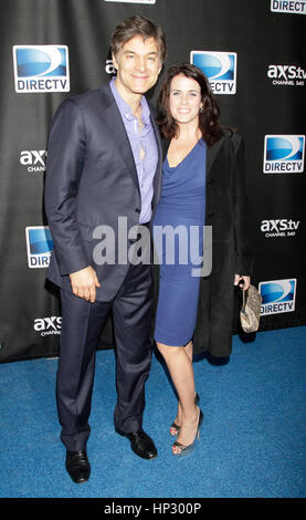 Le Dr Mehmet Oz et sa femme enceinte, Lisa, arrivent pour le Directv Super Saturday Night party le 2 février 2013, à la Nouvelle Orléans, Louisiane. Photo par Francis Specker Banque D'Images