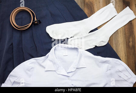 Still Life : Étudiant Thai girl uniforme avec fond de bois sur une vue supérieure Banque D'Images