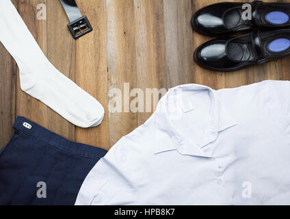 Still Life : Étudiant Thai girl uniforme avec fond de bois sur une vue supérieure Banque D'Images