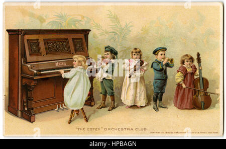 1897 chromolithographic Antique Victorian trade card pour l'Estey Piano Company de New York. Banque D'Images