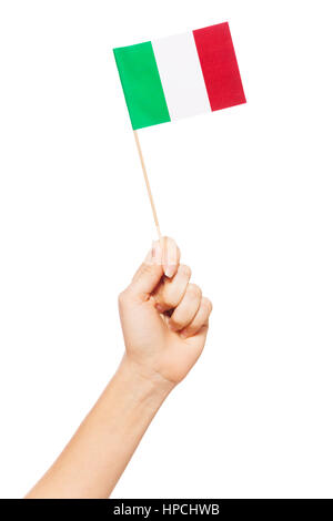 Woman's hand holding et de petit drapeau italien, isolated on white Banque D'Images