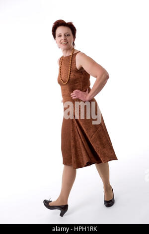 Parution du modèle , Frau, 50 +, im Kleid - femme, robe de Banque D'Images