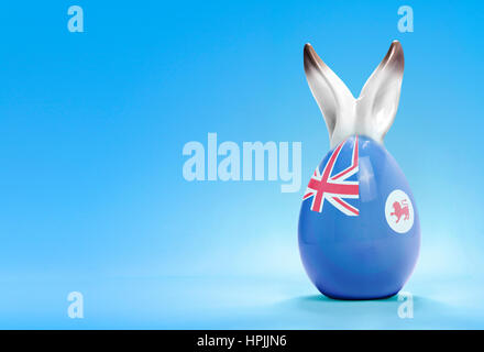 J'oeufs de Pâques colorés en céramique avec oreilles de lapin et le drapeau de la Tasmanie .(série) Banque D'Images