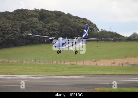 G-CAIS, un de Havilland Canada DHC-6-400 de Viking Air) Twin Otter exploité par Loganair au nom du gouvernement écossais, à l'aéroport de Prestwick. Banque D'Images