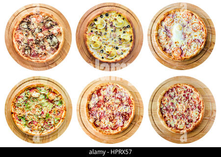 Différents types de pizzas sur un fond blanc Banque D'Images