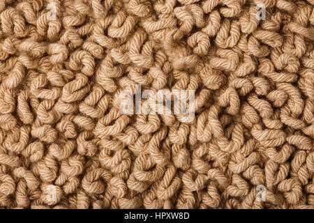 Résumé fond. Macro photo de fluffy moquette beige. Banque D'Images