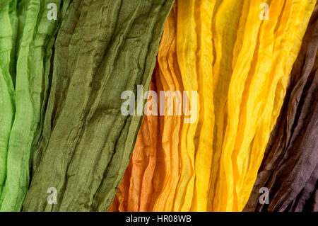 Orange et vert tissu texture shirred soie multi-couleur Banque D'Images