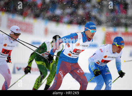 Lahti, Finlande. Feb 26, 2017. Iivo Niskanen à partir de la Finlande et de la Russie Sergey Ustiugov (l-r) en action au cours de la Men's classic sprint par équipe de cross-country demi-finales au Championnat du Monde de Ski à Lahti, Finlande, 26 février 2017. Photo : Hendrik Schmidt/dpa-Zentralbild/dpa/Alamy Live News Banque D'Images