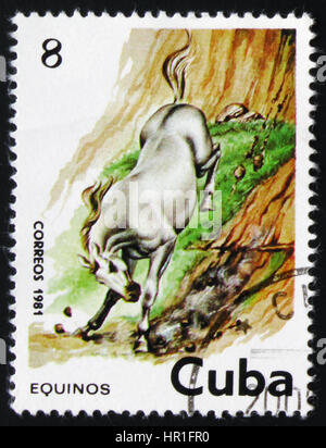 Moscou, Russie - 19 février 2017 : un timbre-poste imprimé en Cuba à partir de la 'question des chevaux, montrant un cheval pâle plongeant d'une falaise, cir Banque D'Images