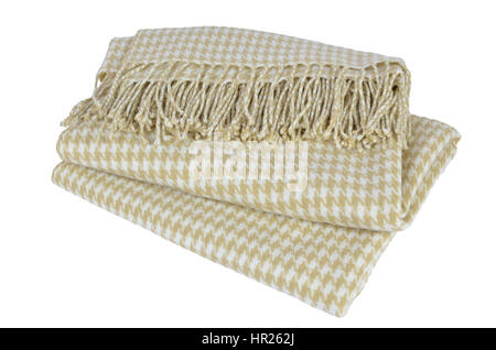 Avec couverture de laine beige et blanc et motif en dents de chiens avec Heather sur blanc Banque D'Images