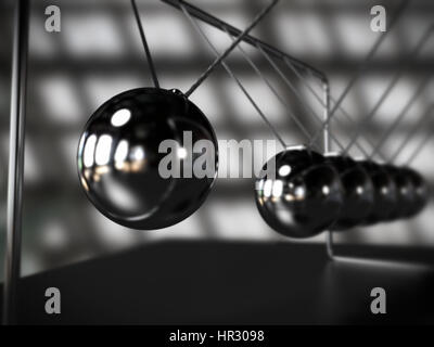 Newton's cradle in motion Banque D'Images