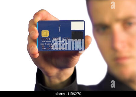 Business man holding up une carte de crédit - Remarque : les chiffres sur la carte de crédit sont composés ainsi que tous les autres numéros sur la carte Banque D'Images