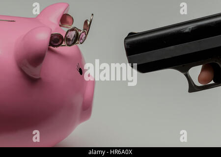 Gun à piggy bank Banque D'Images