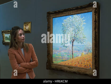 Bonhams, Londres, 27 février 2017. Un membre du personnel de Bonhams admire Francis Picabia's 'Les soutient en fleurs Villeneuve-sur-Yonne", qui devrait vendre pour 130 000 € entre 180 000 € et, à l'impressionniste Bonhams et vente d'art moderne à l'aperçu de la presse leur Mayfair Gallery de Londres. Crédit : Paul Davey/Alamy Live News Banque D'Images