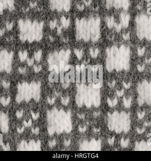 Fond gris, blanc gris mitaines mitaines de laine, motif texturé en laine chaude gants hiver détail, grand vintage vertical détaillé Banque D'Images