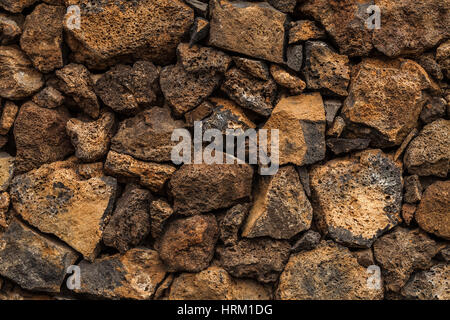 Image du mur de pierres de lave volcanique. Lanzarote, îles Canaries, Espagne. Banque D'Images