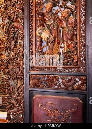 Panneau en bois sculpté dans le Trieu Chau (Chaozhou) Salle de l'Assemblée. L'ancienne ville de Hoi An, Quang Nam Province, Vietnam. Banque D'Images