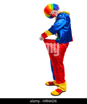 Clown pleine longueur en regardant son pantalon Banque D'Images