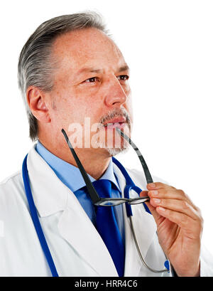 Thoughtful mature doctor isolated on white Banque D'Images