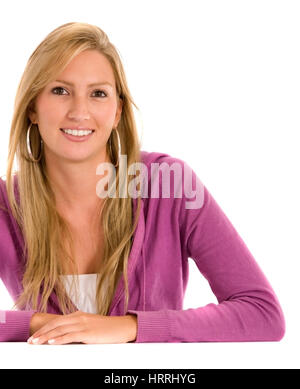 Beauty woman smiling woman leaning on a table Banque D'Images