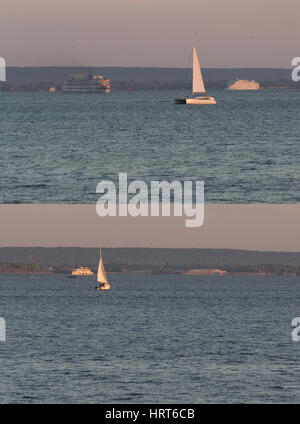 Les bateaux à voile sur l'eau. vertical Banque D'Images