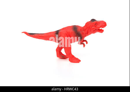 Tyrannosaurus toy rouge et noir sur fond blanc Banque D'Images