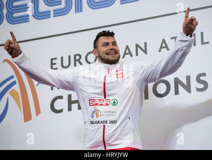 Belgrade, Serbie. 08Th Mar, 2017. Konrad Bukowiecki de Pologne célèbre après le lancer du finale de l'Europe d'athlétisme en salle 2017 finale à Belgrade, Serbie, 04 mars 2017. Photo : Sven Hoppe/dpa/Alamy Live News Banque D'Images