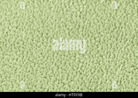 Arrière-plan de moelleux vert clair, doux tissu laineux. La texture de gros plan textile. Banque D'Images