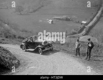 Kitty Brunell la conduite d'un deux-places 1930 Ford Modèle A, 1931. Artiste : Bill Brunell. Banque D'Images