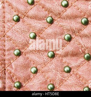 Cuir cousu rouge texture background Banque D'Images