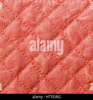Cuir cousu rouge texture background Banque D'Images
