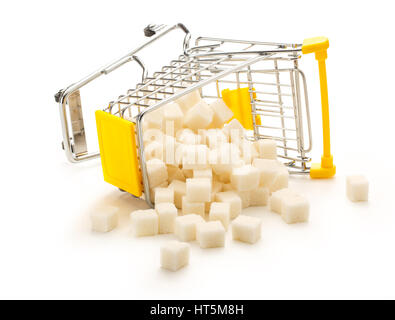 Pushcart tourné avec pile de cubes de sucre blanc Banque D'Images