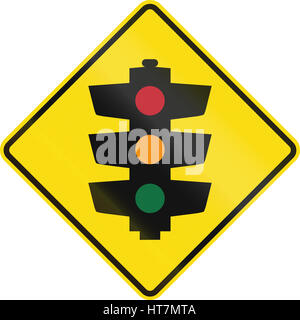 New Zealand road sign Pw-3 - feux de circulation à venir. Banque D'Images