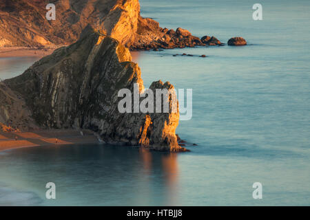 Durdle door et st oswald's Bay à partir de la tête de chauve-souris, à la tombée de la côte jurassique, de Purbeck, Dorset, England, UK Banque D'Images