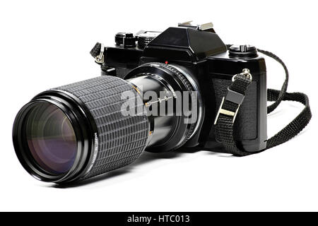 L'analogique appareil photo avec téléobjectif isolé sur fond blanc Banque D'Images