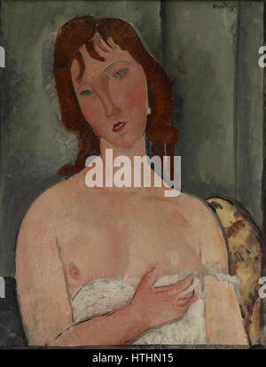 'Portrait d'une jeune femme' d'Amedeo Modigliani est une œuvre emblématique représentant son style de portrait distinctif, caractérisé par des traits allongés et des couleurs douces et discrètes. Le travail met en évidence l'accent mis par Modigliani sur la capture du monde émotionnel intérieur de ses sujets. Banque D'Images