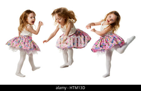 Cute little girl jumping with joy isolé sur fond blanc Banque D'Images