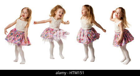 Cute little girl jumping with joy isolé sur fond blanc Banque D'Images