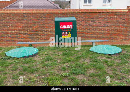 Calor souterrain réservoirs de gaz propane et danger sur un nouveau lotissement, Kent, UK Banque D'Images