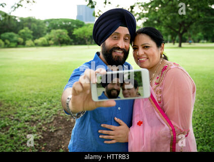 Couple indien Prendre des photos Concept Banque D'Images
