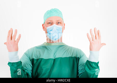 Le port de masque chirurgical chirurgien cap et se préparer pour l'intervention Banque D'Images