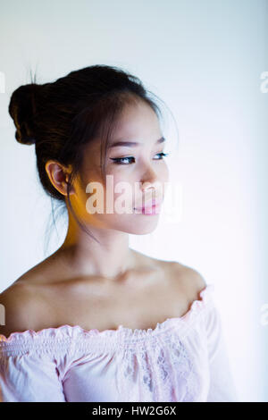 Portrait of smiling Asian woman Banque D'Images
