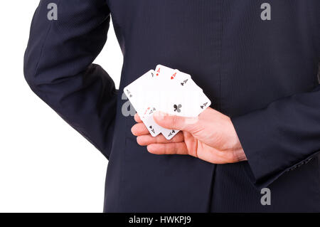 Businessman holding cartes à jouer derrière son dos. Banque D'Images