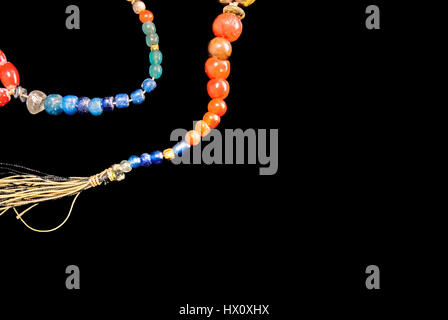 Perles ambrées préhistoriques de l'Asie du Sud-est, qui ont été déterrées à Buni, Bekasi, West Java, Indonésie. Banque D'Images