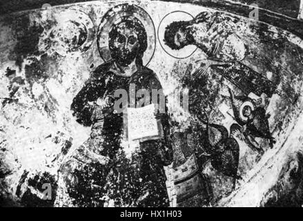 'Deesis' est une peinture murale de l'église Sapara de disposant Saba, située en Géorgie. L'œuvre est une représentation religieuse, faisant partie de la tradition de l'Église orthodoxe géorgienne, illustrant le Christ flanqué de la Vierge Marie et de Jean-Baptiste. Banque D'Images