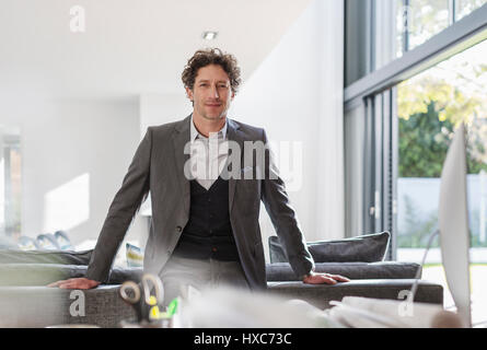 Portrait confiant male architect in home office Banque D'Images