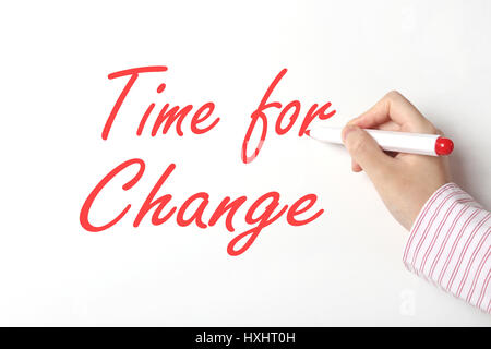 Business Woman writing time for change mot sur tableau blanc Banque D'Images