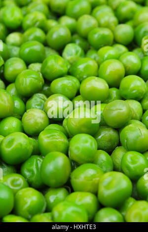 Pois surgelés peases texture background. Motif de fond vert pease. Banque D'Images